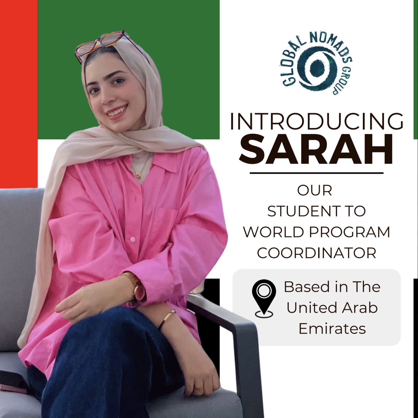 Sarah sitting and smiling with brown glasses on top of her head while wearing a pink blouse, blue pants and a beige hijab. There is a Jordanian flag in the background and the Global Nomads Group logo above text introducing Sarah as the Student to World Program Coordinator based in The United Arab Emirates.